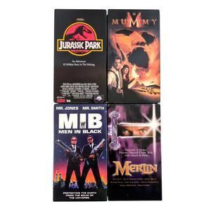 VHS Movie Lot: Jurassic Park, Men in Black, The Mummy, Merlin (Hallmark) - GOOD